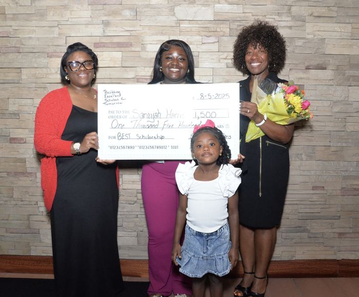 A scholar's family celebrating an award at the 2025 ceremony